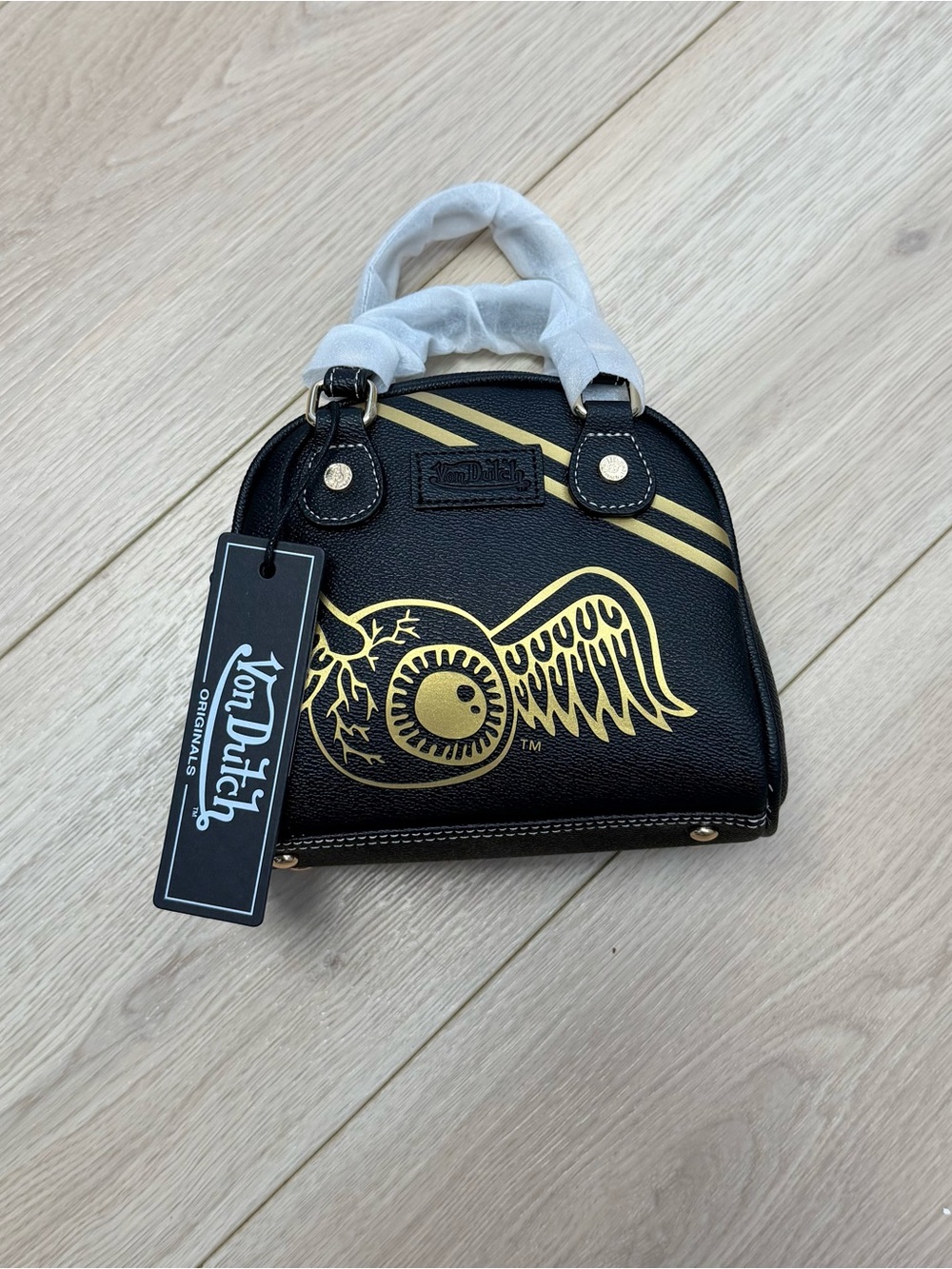 NWT Von Dutch black and gold winged mini satchel with racing stripes